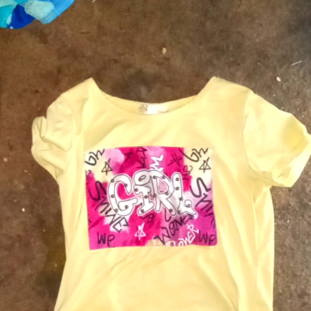 Yellow tee saying girl